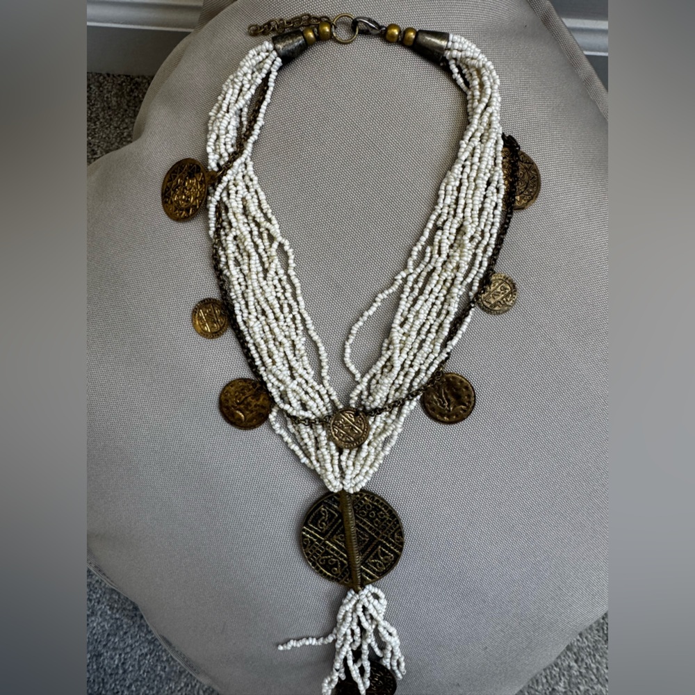 Elegant White Beaded Necklace with Gold Accents